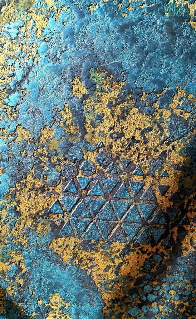 Texturierte blaue und goldene Oberfläche